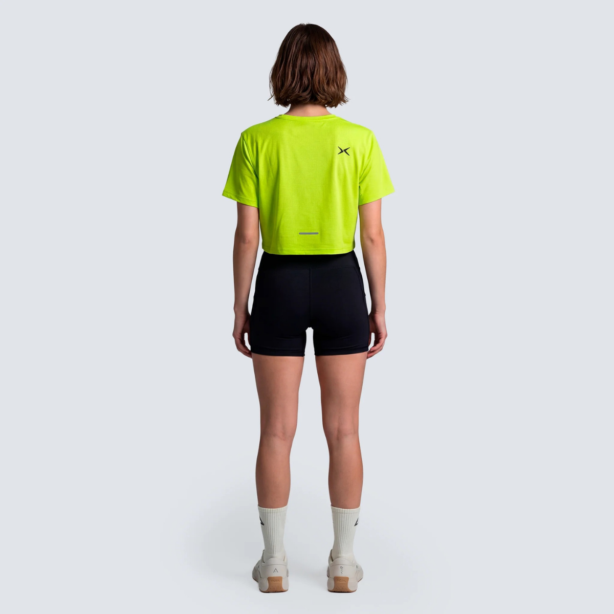 Camisola Crop Performance SS26